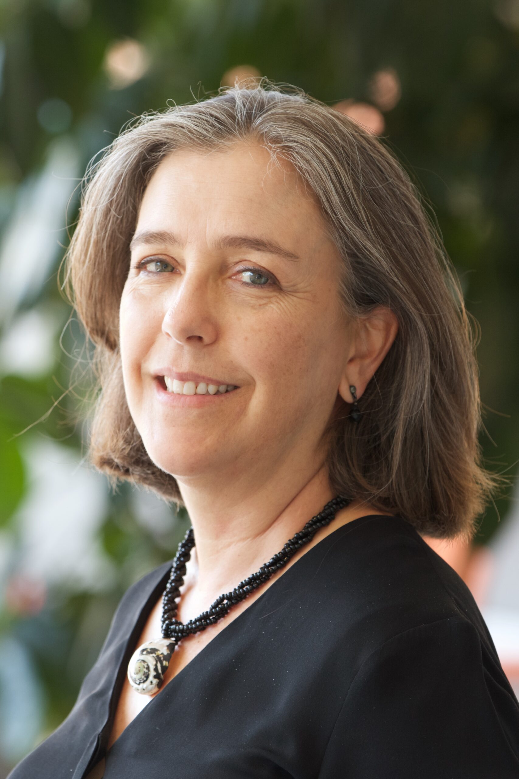 Porträtfoto von Dr. Daniela Büchel, REWE Group